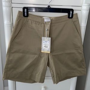 Nike Golf Shorts Never Worn w/Tags.  Dri Fit Size 6.  Khaki color.  Early Y2K.
